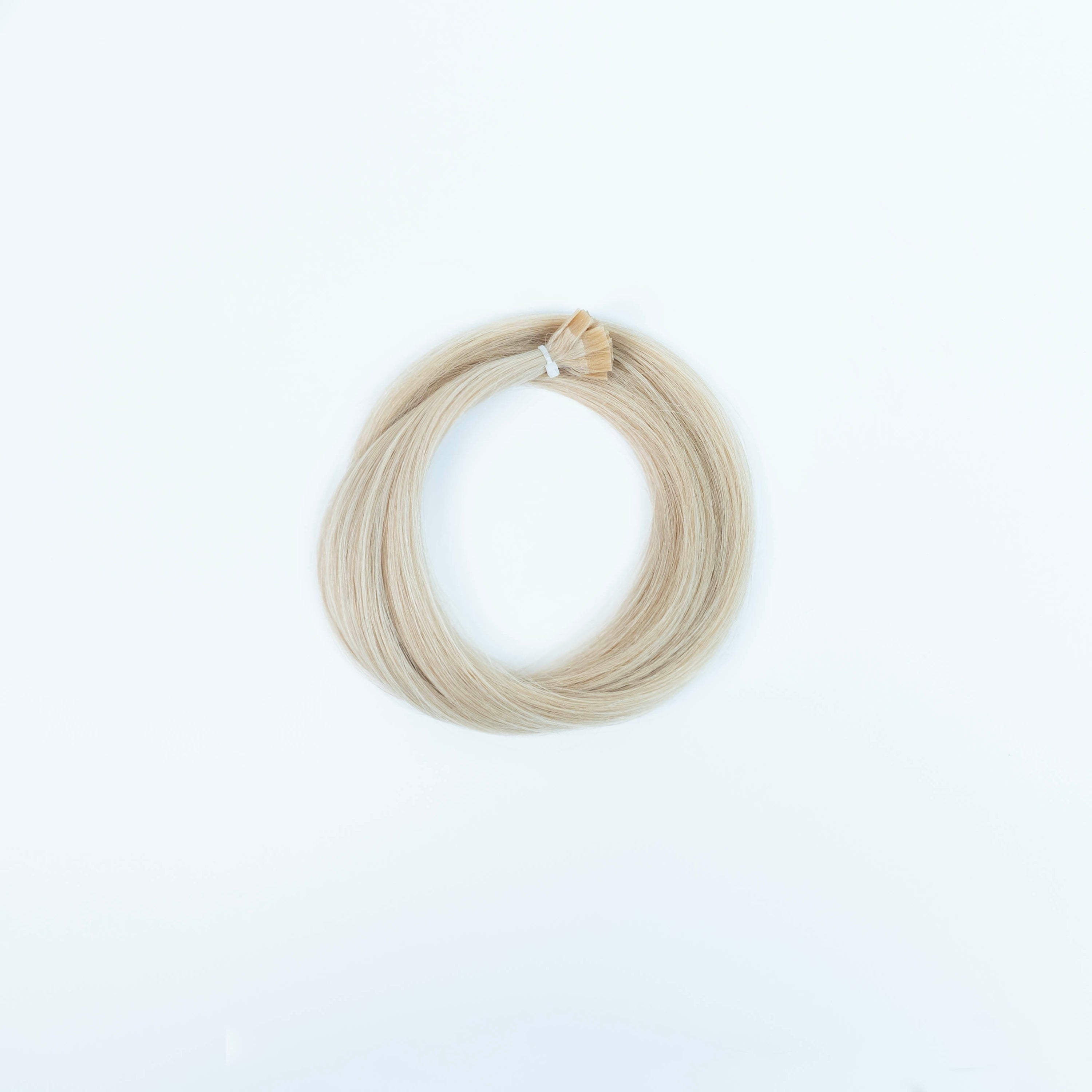 Natūralių plaukų sruogos su keratino kapsule 